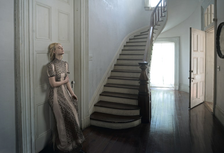 Images may contain: Elle Fanning, Architecture, Architecture, House, Housing, Stairs, Adults, People and Indoors